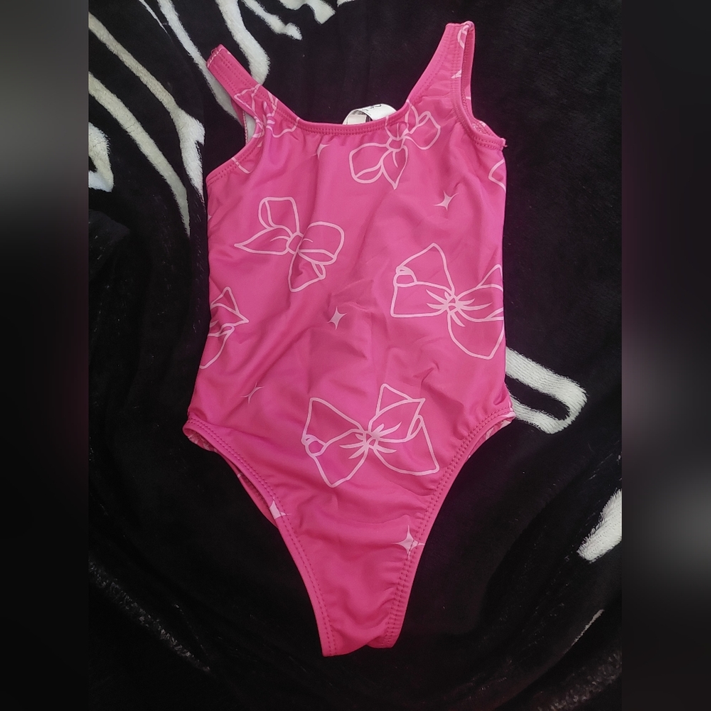 nwt Girls Jojo Siwa one-piece swimsuit small 7/8